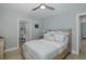 Serene bedroom with a comfortable bed, bedside tables, and soft, cool wall color at 1830 Santa Barbara Dr, Dunedin, FL 34698