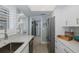 Bright kitchen featuring modern appliances, sleek countertops, and ample storage at 1830 Santa Barbara Dr, Dunedin, FL 34698