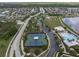 Aerial view of community amenities including tennis courts, playground, pool, and walking trail at 19326 Long Lake Ranch Blvd, Lutz, FL 33558