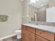Bright bathroom with granite countertop vanity and tiled shower at 19326 Long Lake Ranch Blvd, Lutz, FL 33558