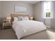 Serene bedroom with a king-size bed, soft lighting, and a calming color scheme at 20021 Golden Glow Loop, Venice, FL 34292