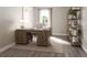 Cozy home office featuring a modern desk, stylish decor, and ample natural light at 20021 Golden Glow Loop, Venice, FL 34292
