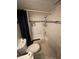 Bathroom featuring a shower and tub with white tile and decorative blue tile at 203 Pine Violet Ct # 202, Tampa, FL 33612