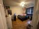 Bedroom with tile flooring, ceiling fan, window with curtains, and a full size bed at 203 Pine Violet Ct # 202, Tampa, FL 33612