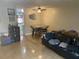 Bright living space with a dining area, tile flooring, and a welcoming atmosphere at 203 Pine Violet Ct # 202, Tampa, FL 33612
