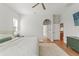 Spacious main bedroom features a large window and an open doorway at 27295 Tarbel Rd, Brooksville, FL 34602