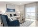 Comfortable living room with a lake view and stylish decor at 288 Voltaire Dr, Spring Hill, FL 34609