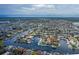 Waterfront community featuring many homes along canals with boat docks at 3150 Trident Ter, New Port Richey, FL 34652