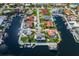 Waterfront home on a canal featuring a private boat dock and lush landscaping providing great curb appeal at 3150 Trident Ter, New Port Richey, FL 34652