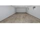 Finished basement boasts tile floors, recessed lighting, and ample space at 3150 Trident Ter, New Port Richey, FL 34652