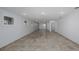 Finished basement offers tile flooring, recessed lights, windows and plenty of space at 3150 Trident Ter, New Port Richey, FL 34652