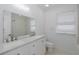 Bathroom featuring double vanity with quartz countertop, toilet, and shower-tub combo at 3150 Trident Ter, New Port Richey, FL 34652