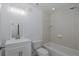 Cozy bathroom with shower/tub combo and modern vanity with updated fixtures at 3150 Trident Ter, New Port Richey, FL 34652