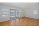 Bedroom features hardwood floors, waterfront views, and plenty of natural light at 3150 Trident Ter, New Port Richey, FL 34652