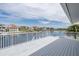 Stunning view of the surrounding canal and waterfront homes from the spacious outdoor deck area at 3150 Trident Ter, New Port Richey, FL 34652