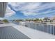 Beautiful canal view from the spacious deck, perfect for enjoying waterfront living and gorgeous scenery at 3150 Trident Ter, New Port Richey, FL 34652