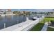 Waterfront access with dock and boat lift, perfect for boating and enjoying waterfront lifestyle in a beautiful neighborhood at 3150 Trident Ter, New Port Richey, FL 34652