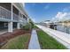 Private boat dock with ample space, lush landscaping, and easy access to deep-waterways at 3150 Trident Ter, New Port Richey, FL 34652