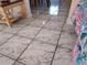 A close-up of the tiled flooring, adding an elegant touch to the home's interior design at 3206 Pinon Dr, Holiday, FL 34691