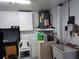 Functional laundry area with water heater and washer/dryer hookups at 3206 Pinon Dr, Holiday, FL 34691