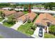 High angle aerial perspective of a single Gathering home with a manicured lawn nestled in a quiet neighborhood at 3317 Abigail Ct, New Port Richey, FL 34655