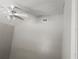 This bedroom has a ceiling fan and neutral walls and ceiling at 3415 N 51St St, Tampa, FL 33619