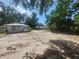 Cottage-style home with a large front yard ready for landscaping at 3415 N 51St St, Tampa, FL 33619