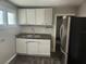 Updated kitchen with modern appliances and ample cabinet space at 3415 N 51St St, Tampa, FL 33619