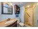 Bathroom featuring tile flooring, shower and vanity at 3841 Lanyard Ct # B, New Port Richey, FL 34652