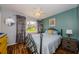 Bedroom with wood floors and good natural light at 3841 Lanyard Ct # B, New Port Richey, FL 34652