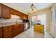 Functional kitchen with stainless steel appliances, and access to backyard at 3841 Lanyard Ct # B, New Port Richey, FL 34652