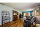 Spacious living room with hardwood floors and access to the outdoor patio at 3841 Lanyard Ct # B, New Port Richey, FL 34652