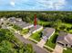Neighborhood aerial view showing the home's placement on a well-landscaped lot in a suburban community at 4082 Watson Dr, New Port Richey, FL 34655