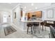 A kitchen featuring wooden cabinets, granite countertops, and stainless appliances at 4082 Watson Dr, New Port Richey, FL 34655