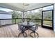 Outdoor patio with beautiful view and wrought iron table and chairs for relaxing afternoons at 4082 Watson Dr, New Port Richey, FL 34655