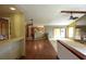 Open floor plan featuring hard wood floors, stone fireplace and open access to kitchen at 4269 River Birch Dr, Spring Hill, FL 34607