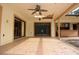 Large covered patio featuring a ceiling fan, tile flooring, and view into the home at 4269 River Birch Dr, Spring Hill, FL 34607