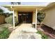 Cozy covered patio perfect for outdoor living and relaxation with mature landscaping at 4269 River Birch Dr, Spring Hill, FL 34607