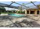 Screened-in pool with patio area at 4269 River Birch Dr, Spring Hill, FL 34607