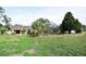 View of screened-in pool and patio area, perfect for relaxation and entertainment in the backyard at 4269 River Birch Dr, Spring Hill, FL 34607