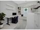 Cozy home office with built in cabinets, window seat, desk and natural lighting at 4287 Woodland Retreat Blvd, New Port Richey, FL 34655