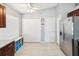 Spacious kitchen with stainless steel appliances, ample cabinet space, and tile flooring, ideal for culinary enthusiasts at 4716 Wolfram Ln, New Port Richey, FL 34653