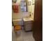 Bathroom with a toilet, vanity, mirror, and bathtub featuring clean lines and functional layout at 6050 Chesham Dr # 3, New Port Richey, FL 34653