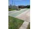 Outdoor shuffleboard court featuring a picnic table between the lanes at 6050 Chesham Dr # 3, New Port Richey, FL 34653