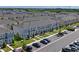 A scenic aerial view of the townhome community, showing landscaping and parking at 6240 Fairmont Ln, Palmetto, FL 34221