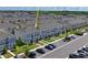 Overhead view of townhomes, showcasing the parking area and green spaces in the community at 6240 Fairmont Ln, Palmetto, FL 34221