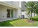 A cozy fenced-in backyard featuring an AC unit and a lush green lawn at 6240 Fairmont Ln, Palmetto, FL 34221