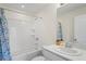 Bright bathroom featuring a shower-tub combination and a vanity with modern fixtures at 6240 Fairmont Ln, Palmetto, FL 34221
