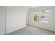 Bedroom with neutral carpeting and a window view at 6240 Fairmont Ln, Palmetto, FL 34221