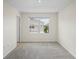 Bedroom with neutral carpeting and a bright window view at 6240 Fairmont Ln, Palmetto, FL 34221